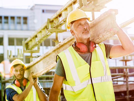 skilled tradesmen practicing safety industrial site