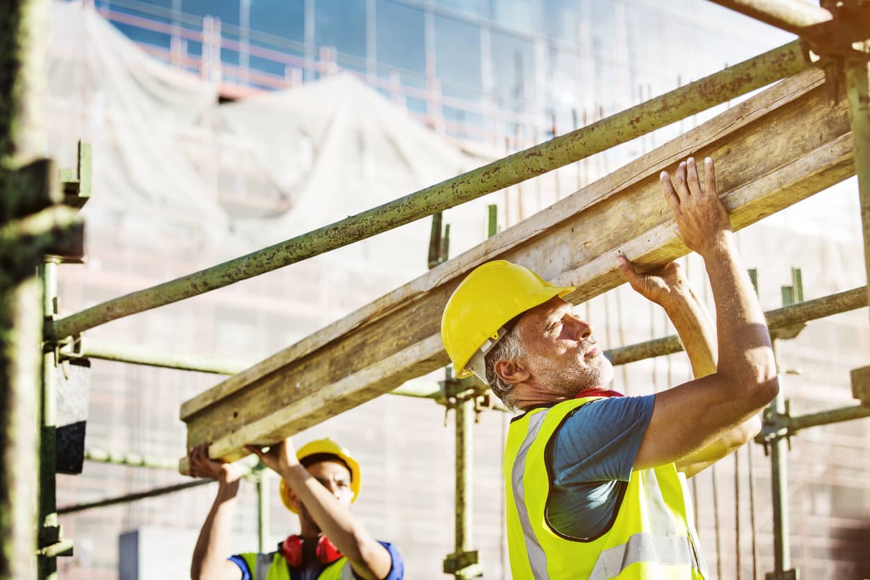 skilled tradesman and laborers on job site