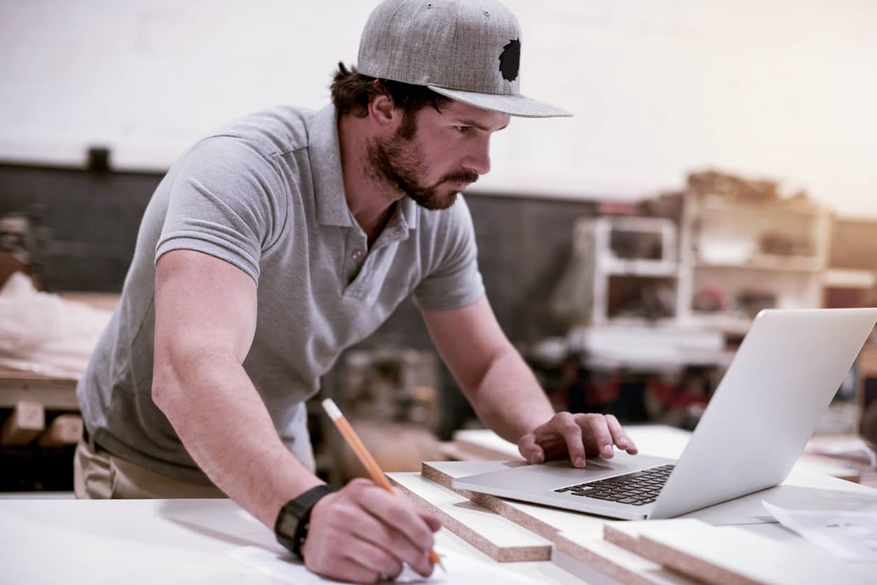 tradesman looking on construction job boards